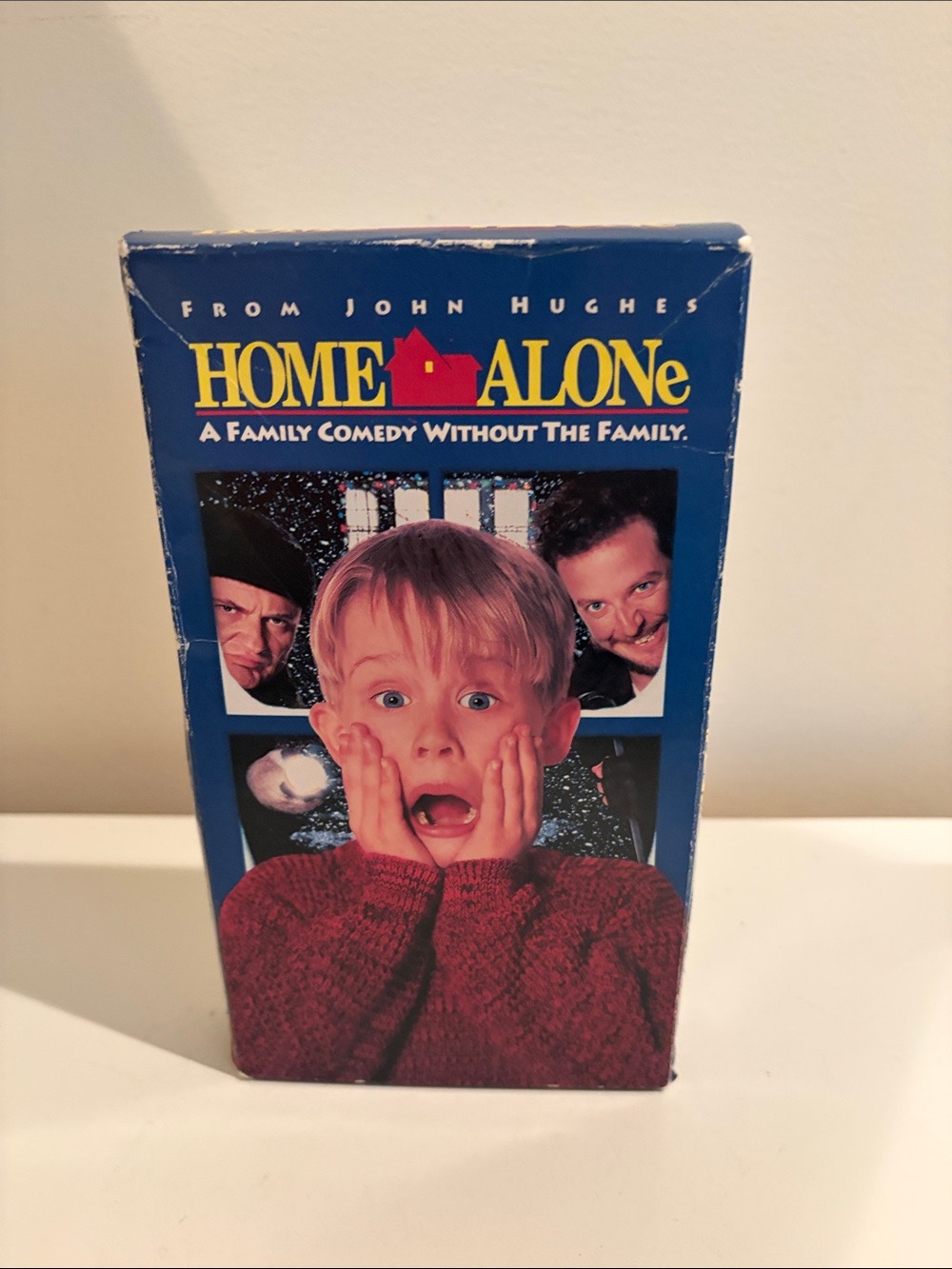 Vintage 1991 Home Alone VHS Tape with Iconic Red Sweater Artwork